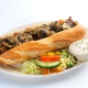 De viersprong stokbroodje gegrilde kipfilet
